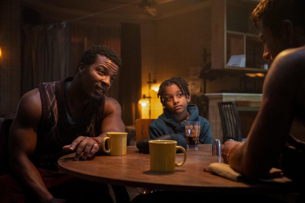 Angelo Gray and Daniel Ezra in The Running Man.